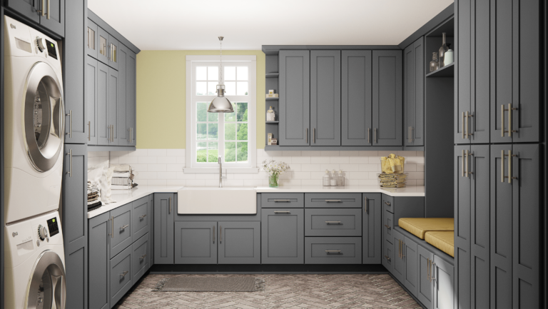 A Laundry Room With Shaker Grey Base Cabinetry, White Countertop, Sink Under Window, and Upper Wall Cabinets