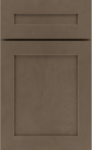 Brown wooden cabinet door with a simple, rectangular design. It features a shaker style with recessed panels, conveying a modern, minimalist feel.