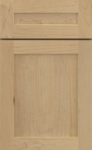 Light natural wood shaker-style cabinet door with visible grain and a recessed center panel with a narrow top rail detail.